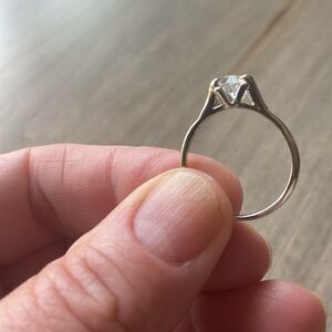 Silver tone faux diamond engagement ring.